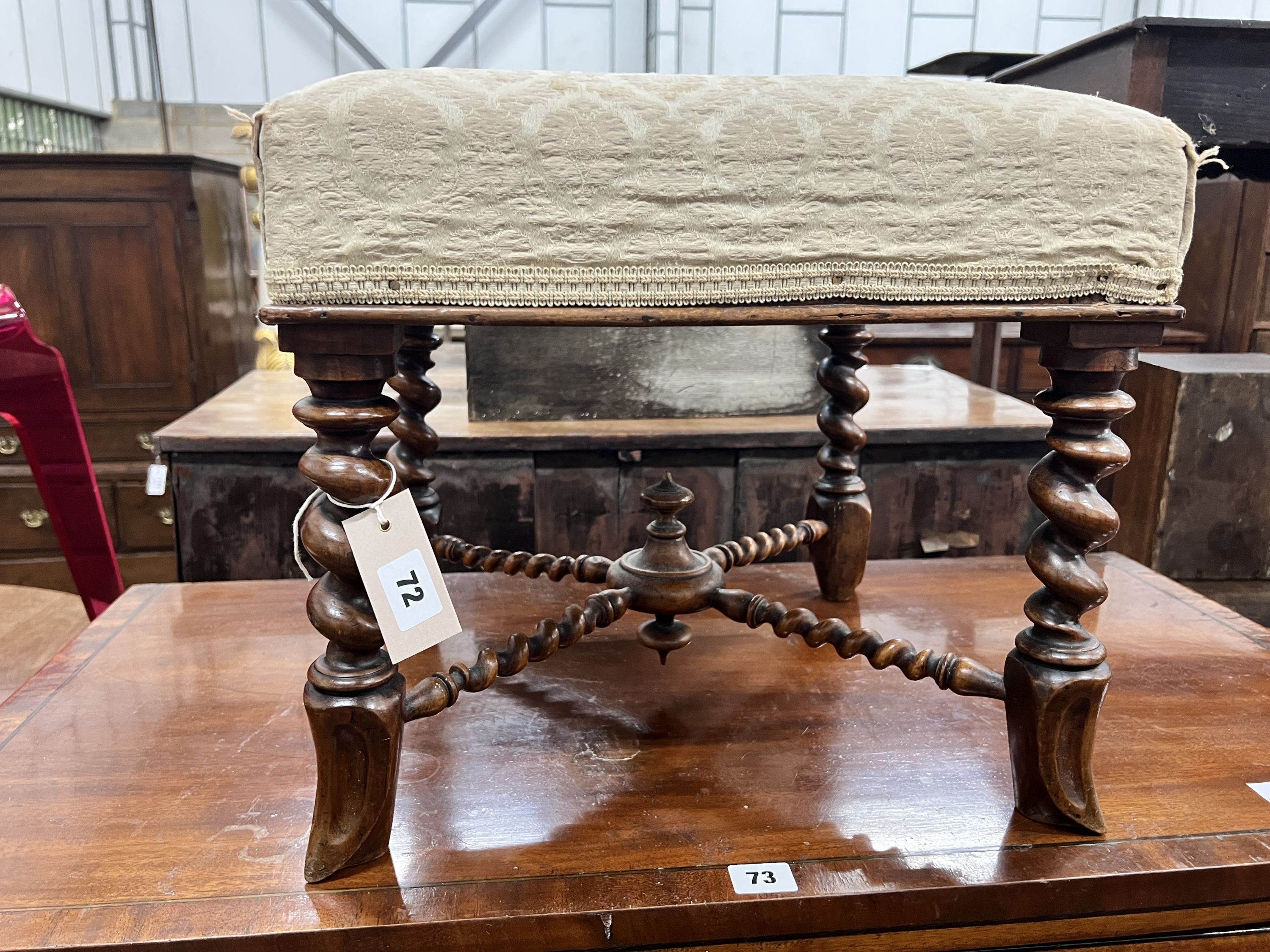 A Victorian walnut frame stool, with square seat and spiral twist legs and cloven hoof feet, width 41cm, height 36cm